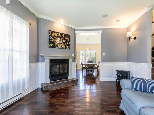 Living room - 39 Rue De Tarascon, Blainville, QC - Indoor Photo Showing Living Room With Fireplace