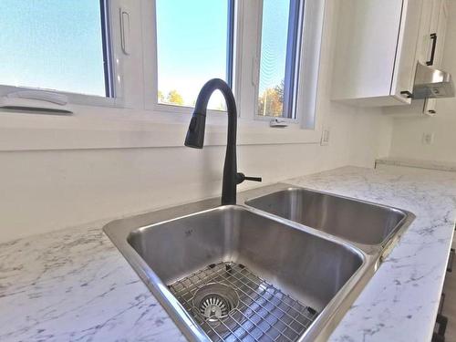 Logement - 274 Ch. H.-Zurenski, Val-Des-Monts, QC - Indoor Photo Showing Kitchen With Double Sink