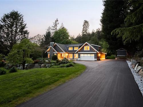 5002 Old West Saanich Rd, Saanich, BC - Outdoor With Facade