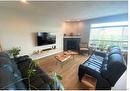 3326 Solport St, Cumberland, BC  - Indoor Photo Showing Living Room With Fireplace 