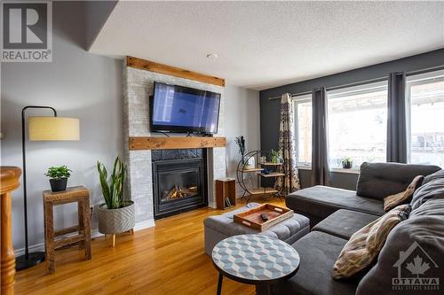 47 Frontenac Street, Embrun, ON - Indoor Photo Showing Living Room With Fireplace