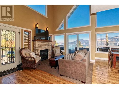 7104 Sante Fe Way, Kelowna, BC - Indoor Photo Showing Living Room With Fireplace