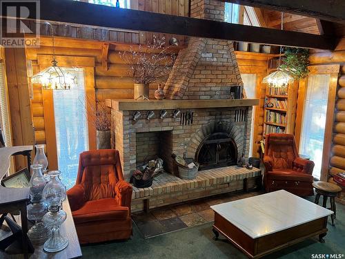 12 Loon Avenue, Greenwater Provincial Park, SK - Indoor Photo Showing Living Room With Fireplace