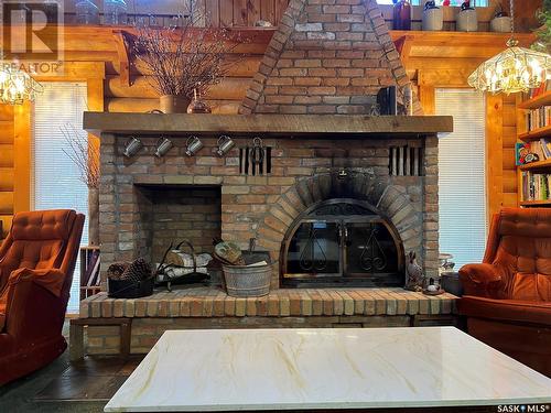 12 Loon Avenue, Greenwater Provincial Park, SK - Indoor Photo Showing Living Room With Fireplace