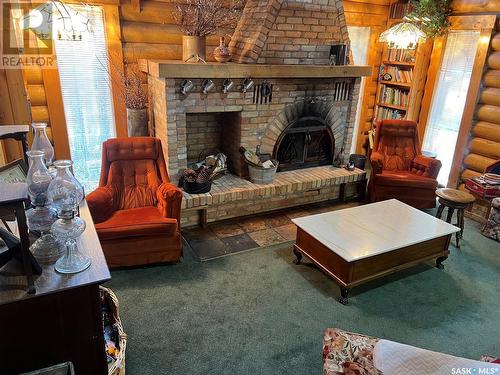 12 Loon Avenue, Greenwater Provincial Park, SK - Indoor Photo Showing Living Room With Fireplace