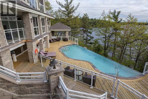 L204 - 1869 Muskoka 118 (A1) Road W, Bracebridge, ON - Outdoor With In Ground Pool