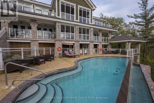 L204 - 1869 Muskoka 118 (A1) Road W, Bracebridge, ON - Outdoor With In Ground Pool With Balcony