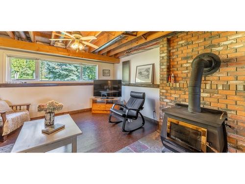 2575 Sinclair Rd, Lister, BC - Indoor Photo Showing Living Room With Fireplace