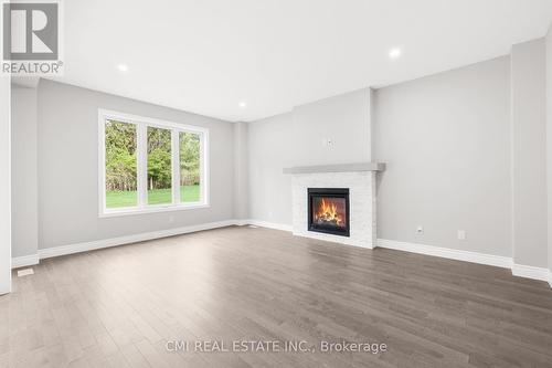 117 Birdie Court, Woodstock, ON - Indoor Photo Showing Living Room With Fireplace