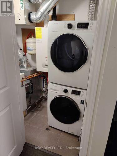 12 - 100 Long Branch Avenue, Toronto, ON - Indoor Photo Showing Laundry Room