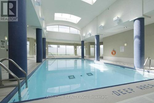 926 - 18 Mondeo Drive, Toronto, ON - Indoor Photo Showing Other Room With In Ground Pool