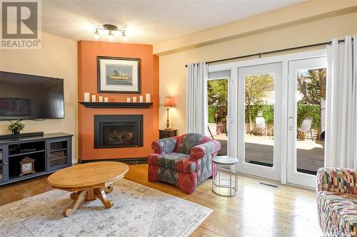 4055 Gordon Road, Regina, SK - Indoor Photo Showing Living Room With Fireplace