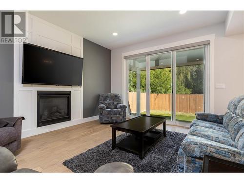 1803 50 Avenue, Vernon, BC - Indoor Photo Showing Living Room With Fireplace