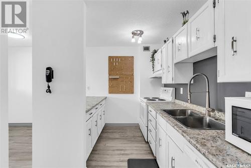 208 351 Saguenay Drive, Saskatoon, SK - Indoor Photo Showing Kitchen With Double Sink