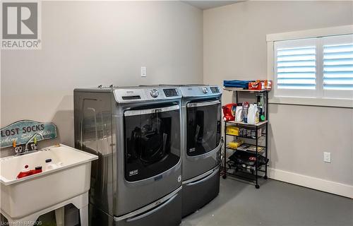 Laundry room has walk-out to double car garage - 395 Northport Drive, Port Elgin, ON - Indoor Photo Showing Laundry Room