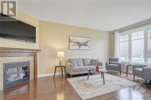 203 Brambling Way, Ottawa, ON - Indoor Photo Showing Living Room With Fireplace