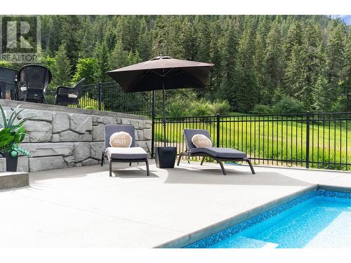 8590 Harbour Heights Road, Vernon, BC - Outdoor With In Ground Pool With Backyard
