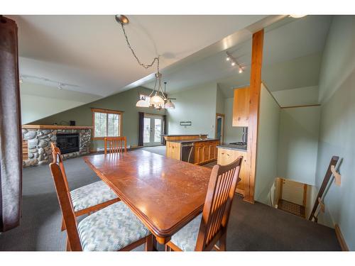 201D - 33 Rivermount Place, Fernie, BC - Indoor Photo Showing Dining Room With Fireplace