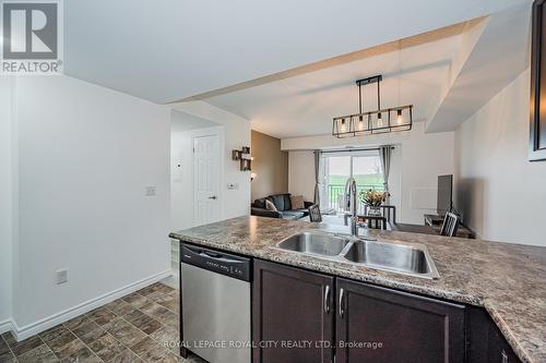 203 - 67 Kingsbury Square, Guelph, ON - Indoor Photo Showing Kitchen With Double Sink