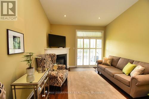 26 Toulon Avenue, Hamilton, ON - Indoor Photo Showing Living Room With Fireplace