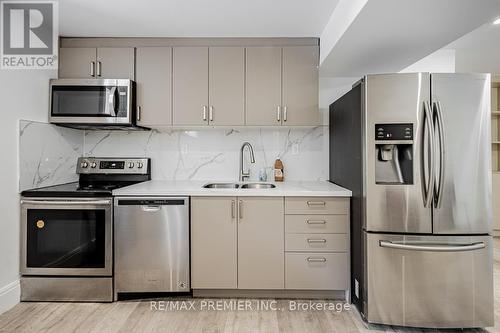 29 Millburn Drive, Toronto, ON - Indoor Photo Showing Kitchen With Double Sink