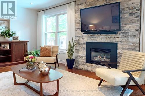 1475 Stoneybrook Trail, Oakville, ON - Indoor Photo Showing Living Room With Fireplace