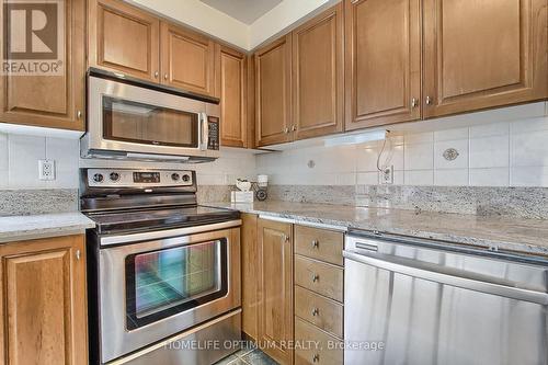 303 - 1 Deer Park Crescent E, Toronto, ON - Indoor Photo Showing Kitchen With Upgraded Kitchen