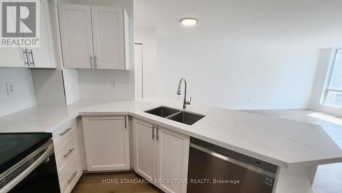 1802 - 25 Grenville Street, Toronto, ON - Indoor Photo Showing Kitchen With Double Sink