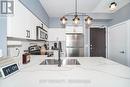 730 - 231 Fort York Boulevard, Toronto, ON  - Indoor Photo Showing Kitchen With Double Sink 