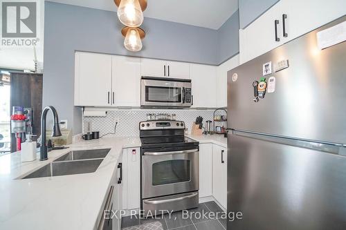 730 - 231 Fort York Boulevard, Toronto, ON - Indoor Photo Showing Kitchen With Double Sink With Upgraded Kitchen