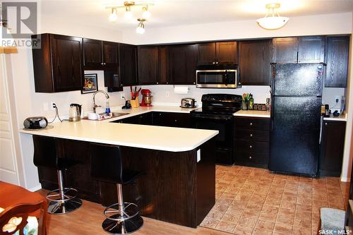 109 215 Smith Street N, Regina, SK - Indoor Photo Showing Kitchen