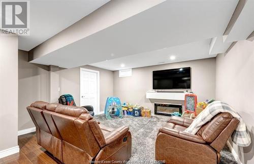 10363 Beverly Glen, Windsor, ON - Indoor Photo Showing Basement With Fireplace