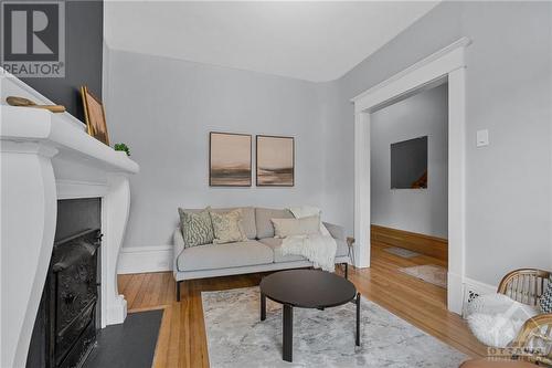 20 Regent Street, Ottawa, ON - Indoor Photo Showing Living Room With Fireplace