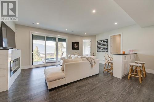 3410 Chocolate Lily Lane, Kelowna, BC - Indoor Photo Showing Living Room With Fireplace