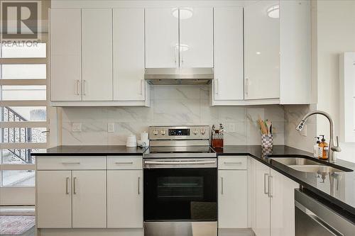 3410 Chocolate Lily Lane, Kelowna, BC - Indoor Photo Showing Kitchen With Upgraded Kitchen