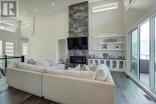 3410 Chocolate Lily Lane, Kelowna, BC - Indoor Photo Showing Living Room With Fireplace