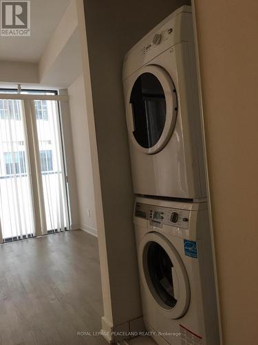 509 - 57 St Joseph Street, Toronto, ON - Indoor Photo Showing Laundry Room
