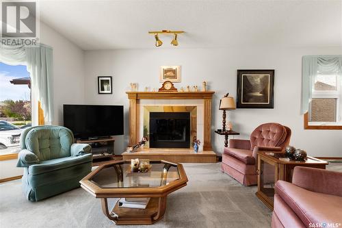 2214 Assiniboine Avenue E, Regina, SK - Indoor Photo Showing Living Room With Fireplace