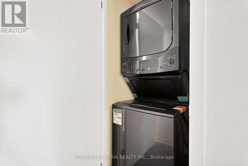 920 - 38 Joe Shuster Way, Toronto, ON - Indoor Photo Showing Laundry Room