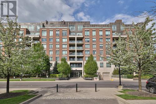 317 - 2470 Prince Michael Drive, Oakville, ON - Outdoor With Balcony With Facade