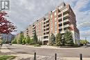 317 - 2470 Prince Michael Drive, Oakville, ON  - Outdoor With Balcony With Facade 
