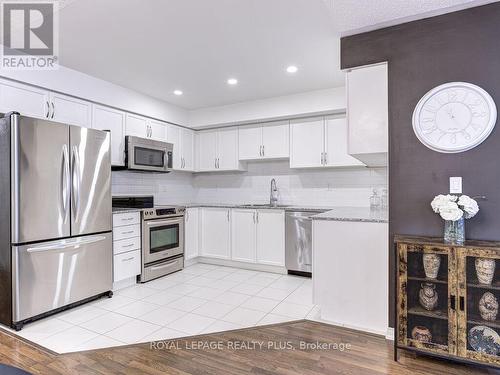 520 - 142 Widdicombe Hill Boulevard N, Toronto, ON - Indoor Photo Showing Kitchen With Upgraded Kitchen