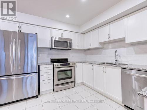 520 - 142 Widdicombe Hill Boulevard N, Toronto, ON - Indoor Photo Showing Kitchen With Double Sink With Upgraded Kitchen