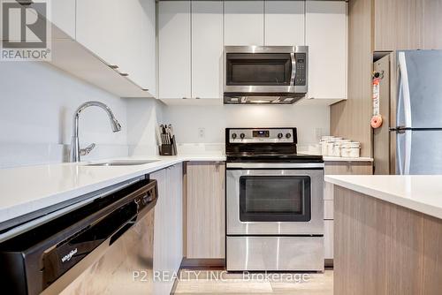 309C - 5260 Dundas Street, Burlington, ON - Indoor Photo Showing Kitchen With Upgraded Kitchen