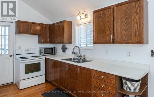 67 Telecom Road, Kawartha Lakes, ON - Indoor Photo Showing Kitchen With Double Sink