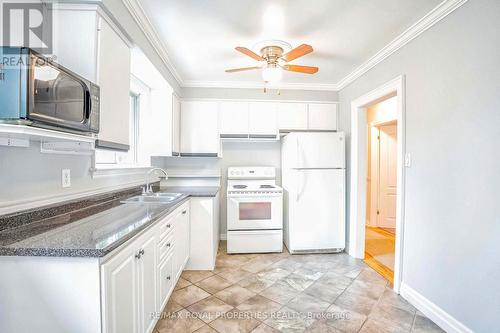 112 Mossbank Drive, Toronto, ON - Indoor Photo Showing Kitchen With Double Sink