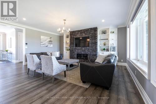 121 Gilson Street, Kawartha Lakes, ON - Indoor Photo Showing Living Room With Fireplace