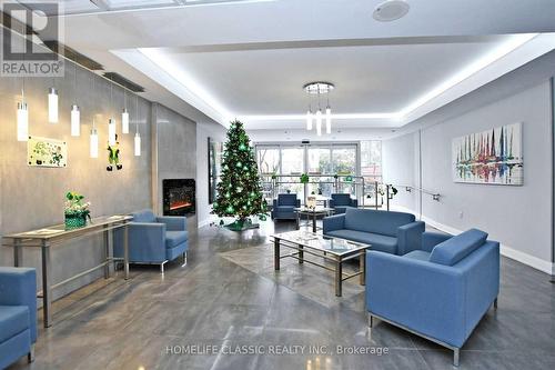 609 - 20 Harding Boulevard, Richmond Hill, ON - Indoor Photo Showing Living Room With Fireplace