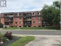 303 - 552 Dundas Street E, Whitby (Downtown Whitby), ON  - Outdoor With Balcony With Facade 