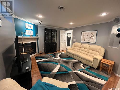 1107 Kerr Road, Saskatoon, SK - Indoor Photo Showing Living Room With Fireplace